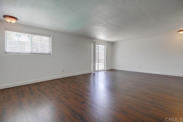 1695 Bubbling Well Dr, San Diego, CA 92154 - unfurnished room featuring dark wood-style flooring and baseboards