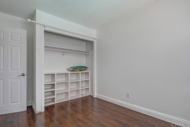 1695 Bubbling Well Dr, San Diego, CA 92154 - unfurnished bedroom featuring wood finished floors, a closet, a textured ceiling, and baseboards