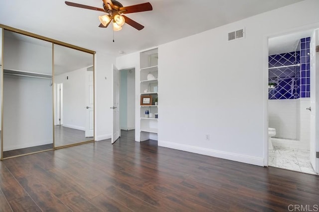 1695 Bubbling Well Dr, San Diego, CA 92154 - unfurnished bedroom with wood finished floors, baseboards, connected bathroom, a closet, and a ceiling fan