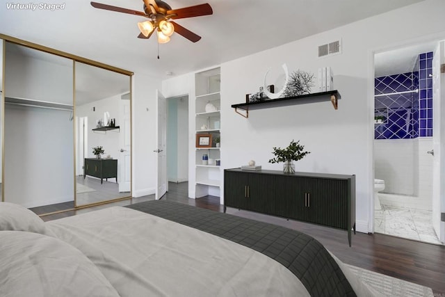 1695 Bubbling Well Dr, San Diego, CA 92154 - bedroom featuring wood finished floors, baseboards, a closet, connected bathroom, and ceiling fan