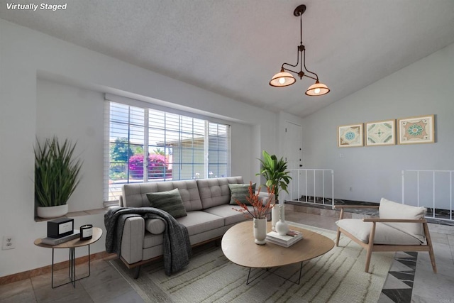 1695 Bubbling Well Dr, San Diego, CA 92154 - living room featuring lofted ceiling