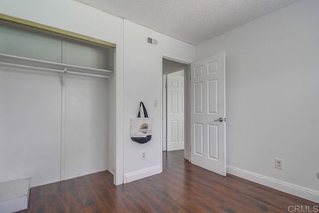 1695 Bubbling Well Dr, San Diego, CA 92154 - unfurnished bedroom featuring wood finished floors, a closet, a textured ceiling, and baseboards