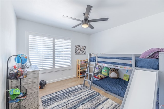 41438 Almond Ave, Palmdale, CA 93551 - bedroom with wood finished floors, baseboards, and a ceiling fan