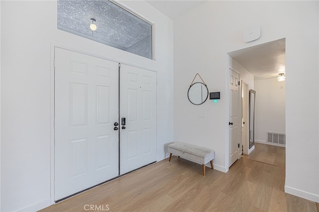 41438 Almond Ave, Palmdale, CA 93551 - entryway with light wood-style floors and baseboards