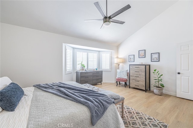 41438 Almond Ave, Palmdale, CA 93551 - bedroom with high vaulted ceiling, light wood finished floors, baseboards, and ceiling fan
