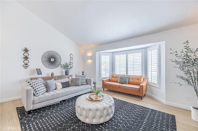 41438 Almond Ave, Palmdale, CA 93551 - living area with light wood-style flooring, baseboards, and vaulted ceiling