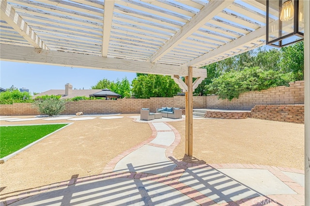 41438 Almond Ave, Palmdale, CA 93551 - fenced backyard featuring a patio, an outdoor living space, and a pergola