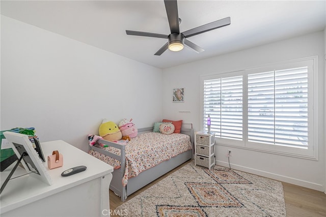 41438 Almond Ave, Palmdale, CA 93551 - bedroom featuring light wood-type flooring, baseboards, and ceiling fan