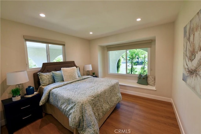 2821 Tucker Ln, Rossmoor, CA 90720 - bedroom featuring dark wood-style flooring, baseboards, and recessed lighting