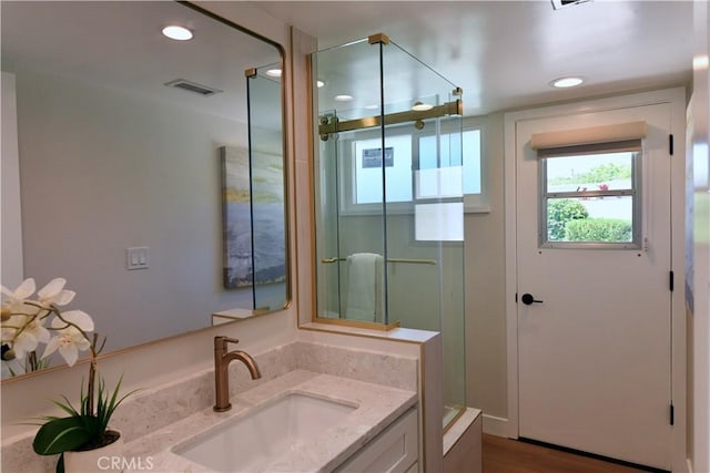 2821 Tucker Ln, Rossmoor, CA 90720 - bathroom with vanity, a shower with shower door, and recessed lighting