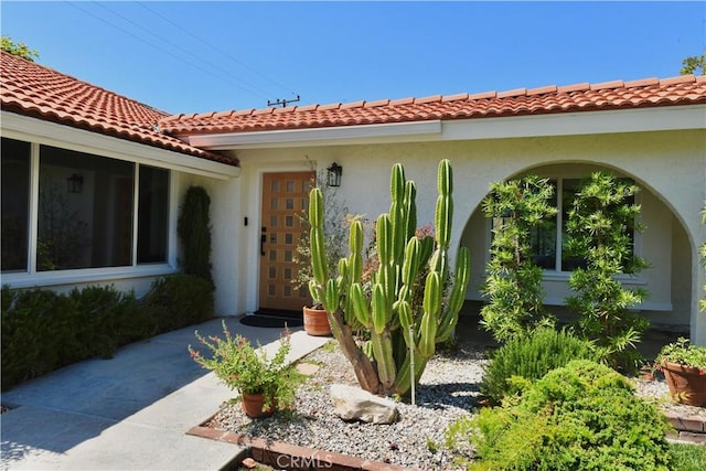 2821 Tucker Ln, Rossmoor, CA 90720 - entrance to property featuring a tile roof and stucco siding