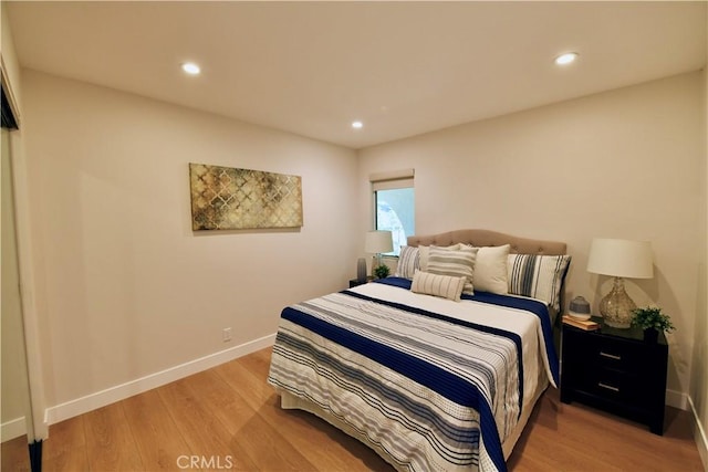 2821 Tucker Ln, Rossmoor, CA 90720 - bedroom with light wood-style floors, recessed lighting, and baseboards
