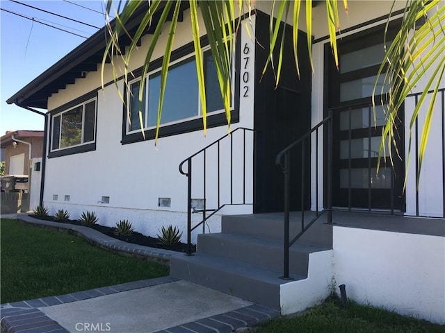 6702 E El Progreso St, Long Beach, CA 90815 - view of side of property with crawl space and board and batten siding