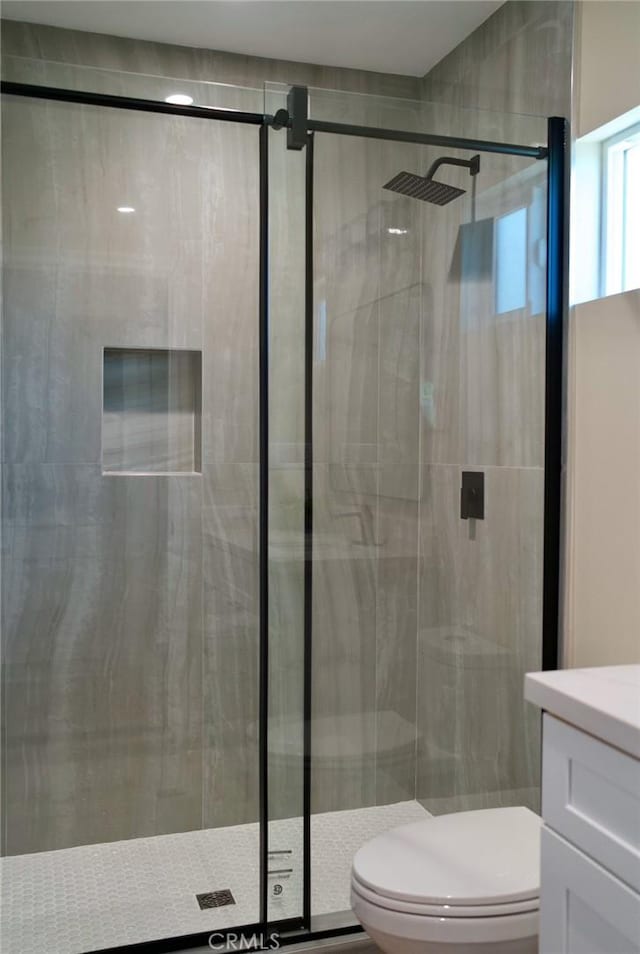 6702 E El Progreso St, Long Beach, CA 90815 - full bath with toilet, vanity, and a stall shower