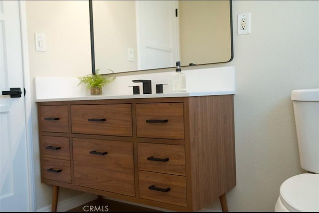 6702 E El Progreso St, Long Beach, CA 90815 - half bathroom with toilet and vanity