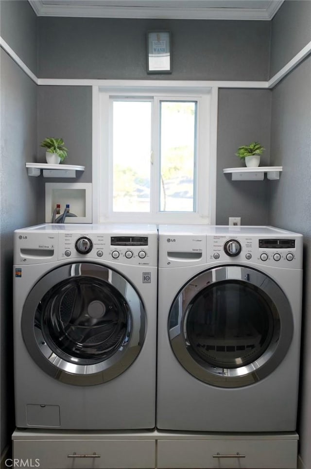 6702 E El Progreso St, Long Beach, CA 90815 - laundry room with independent washer and dryer and ornamental molding