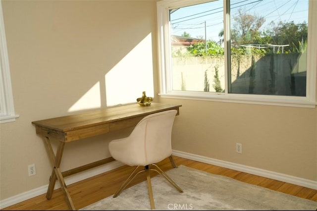 6702 E El Progreso St, Long Beach, CA 90815 - office area featuring baseboards and wood finished floors