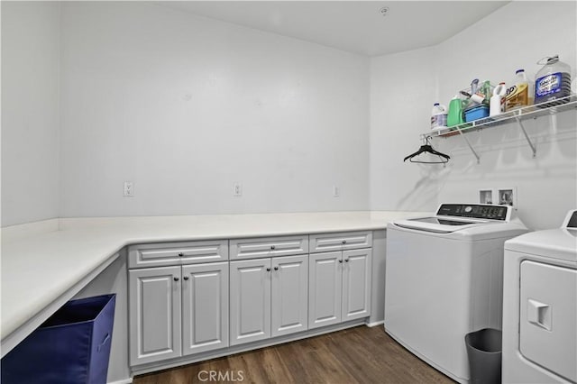 26344 Leos Trl, Menifee, CA 92586 - washroom featuring cabinet space, dark wood-style flooring, and washer and clothes dryer