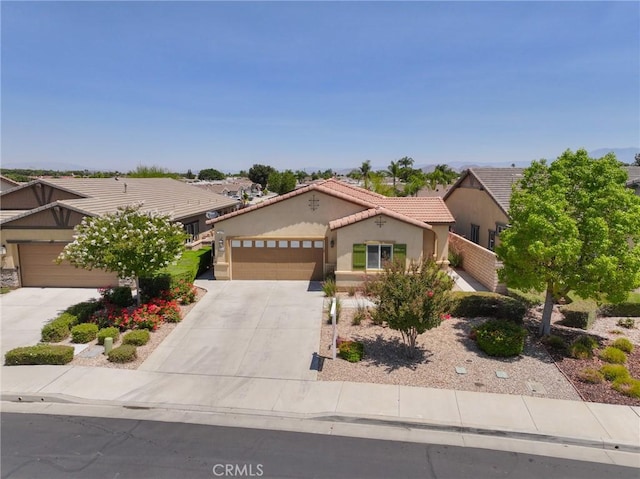26344 Leos Trl, Menifee, CA 92586 - mediterranean / spanish home featuring stucco siding, a tiled roof, concrete driveway, and an attached garage