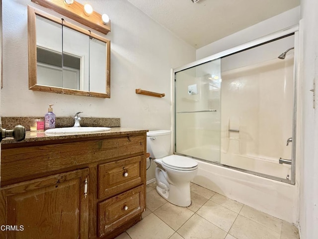 1431 Holly Ave, Oxnard, CA 93036 - full bath with vanity, bath / shower combo with glass door, and tile patterned floors