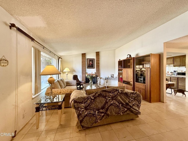 1431 Holly Ave, Oxnard, CA 93036 - living area with a textured ceiling and light tile patterned floors