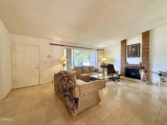 1431 Holly Ave, Oxnard, CA 93036 - living area with light tile patterned floors, a textured ceiling, and a fireplace