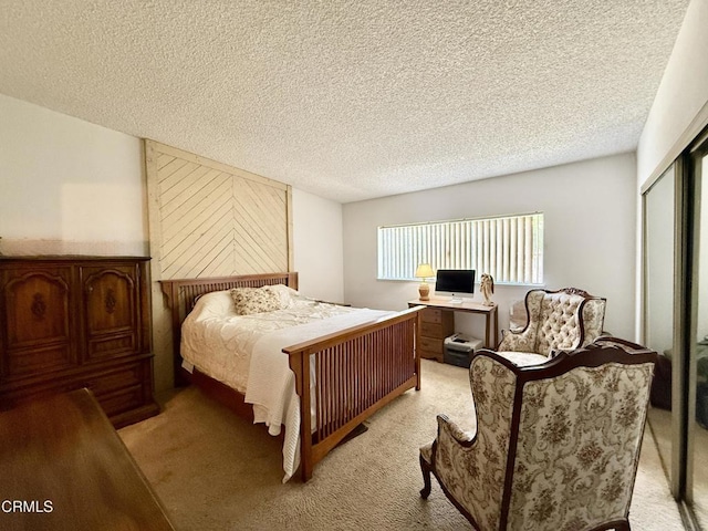 1431 Holly Ave, Oxnard, CA 93036 - bedroom with light colored carpet, a closet, an office area, and a textured ceiling