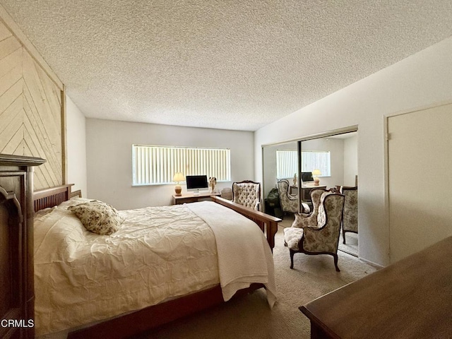 1431 Holly Ave, Oxnard, CA 93036 - bedroom featuring carpet floors, a textured ceiling, and a closet