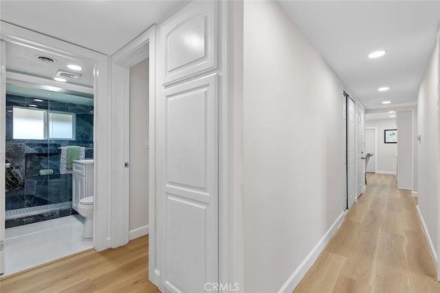 14752 Donegal Dr, Garden Grove, CA 92844 - hallway with light wood-style flooring, baseboards, and recessed lighting