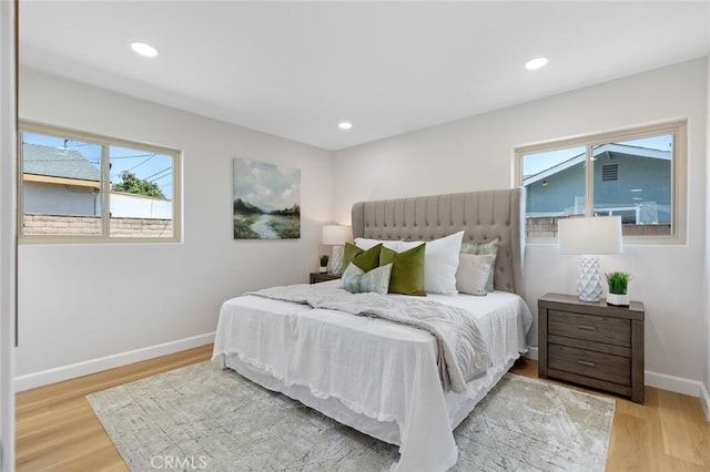 14752 Donegal Dr, Garden Grove, CA 92844 - bedroom featuring multiple windows, light wood-style floors, baseboards, and recessed lighting