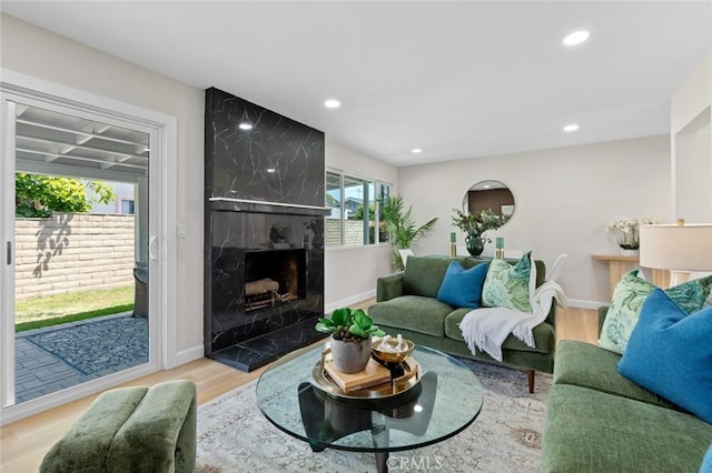 14752 Donegal Dr, Garden Grove, CA 92844 - living room with wood finished floors, a premium fireplace, baseboards, and recessed lighting
