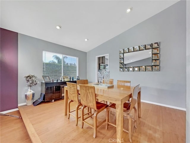 51 Rolling Hills Dr, Phillips Ranch, CA 91766 - dining area with wood finished floors, vaulted ceiling, and recessed lighting