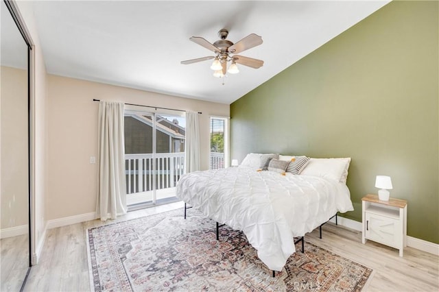 53 Briarwood Ln Unit 81, Aliso Viejo, CA 92656 - bedroom featuring wood finished floors, access to exterior, vaulted ceiling, a ceiling fan, and a closet