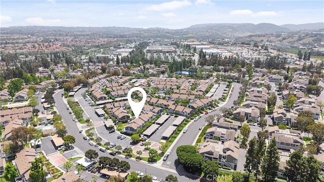 53 Briarwood Ln Unit 81, Aliso Viejo, CA 92656 - aerial overview of property's location with a mountain backdrop and nearby suburban area