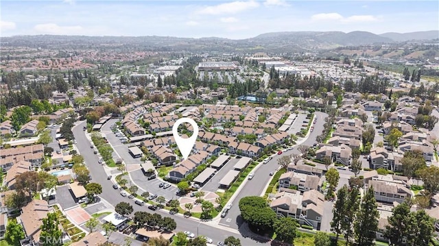 53 Briarwood Ln Unit 81, Aliso Viejo, CA 92656 - aerial overview of property's location with a mountain backdrop and nearby suburban area