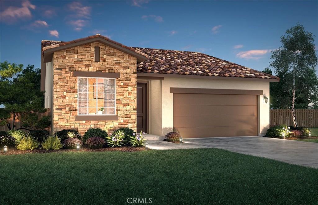 806 Jovan Ct, Merced, CA 95348 - view of front of house with stone siding, a tiled roof, concrete driveway, a garage, and stucco siding