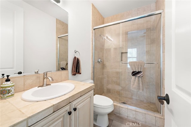 4 Dennis Ln, Ladera Ranch, CA 92694 - bathroom featuring toilet, vanity, and a stall shower