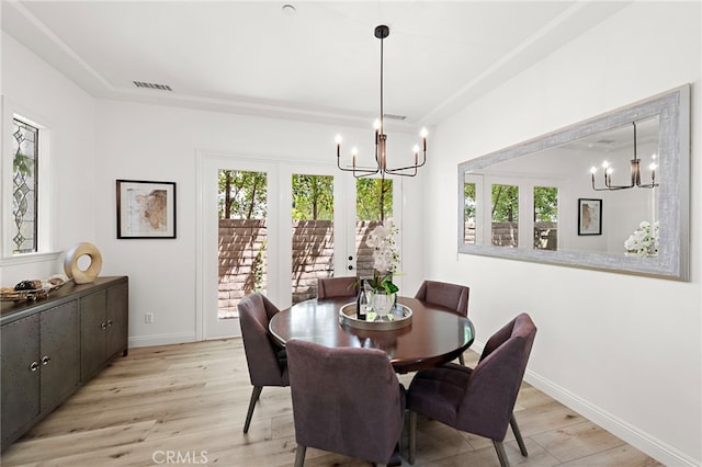 4 Dennis Ln, Ladera Ranch, CA 92694 - dining room with a chandelier, healthy amount of natural light, and light wood-type flooring