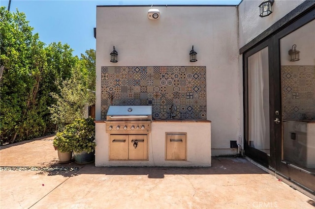 11101 Blix St, Toluca Lake, CA 91602 - view of patio with area for grilling and a sink