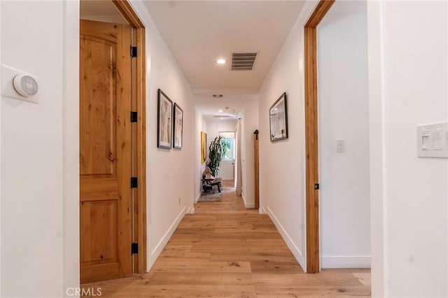 11101 Blix St, Toluca Lake, CA 91602 - hallway featuring light wood finished floors and recessed lighting