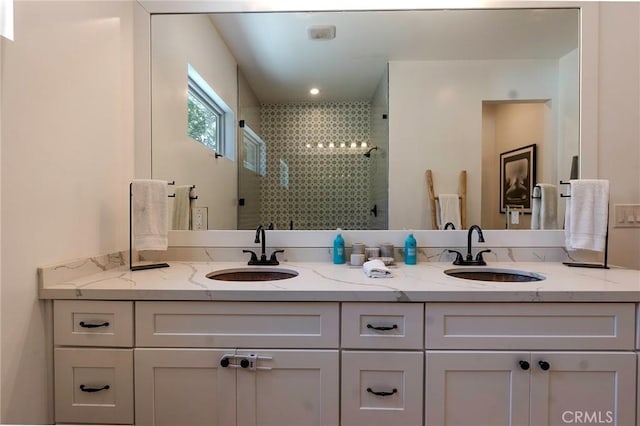 11101 Blix St, Toluca Lake, CA 91602 - bathroom with double vanity and a shower stall