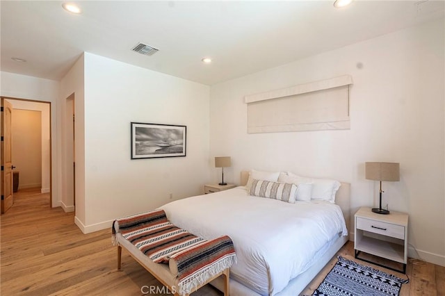 11101 Blix St, Toluca Lake, CA 91602 - bedroom featuring light wood finished floors and recessed lighting