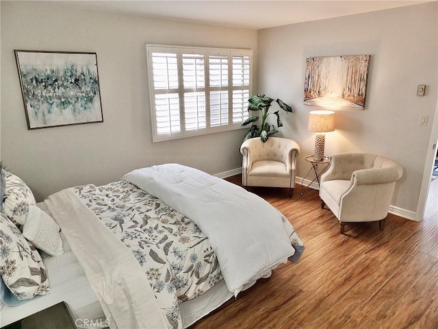 1039 E Appleton St Unit 2, Long Beach, CA 90802 - bedroom with wood finished floors and baseboards