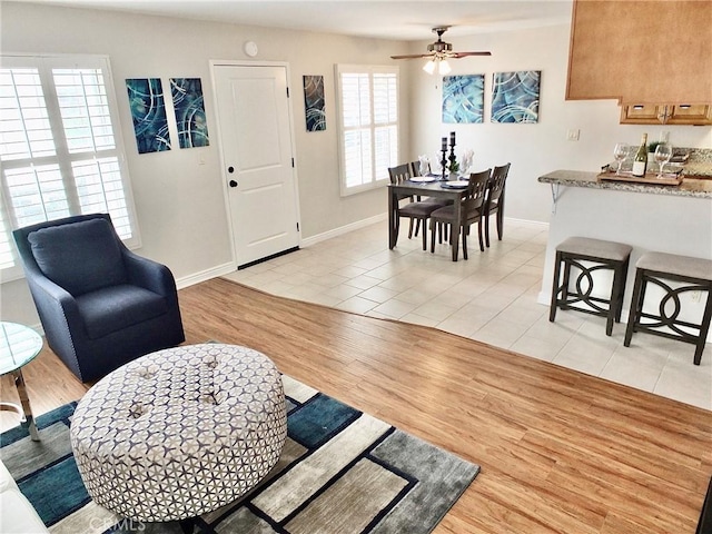 1039 E Appleton St Unit 2, Long Beach, CA 90802 - living area featuring light wood finished floors, ceiling fan, and baseboards