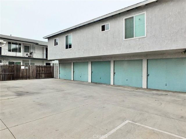 1039 E Appleton St Unit 2, Long Beach, CA 90802 - back of property featuring stucco siding and a garage