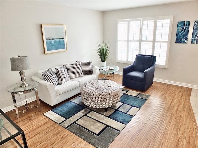 1039 E Appleton St Unit 2, Long Beach, CA 90802 - living room with baseboards and wood finished floors
