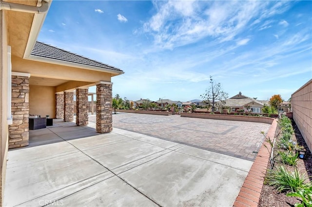 13691 Cobalt Ct, Rancho Cucamonga, CA 91739 - view of patio featuring a residential view