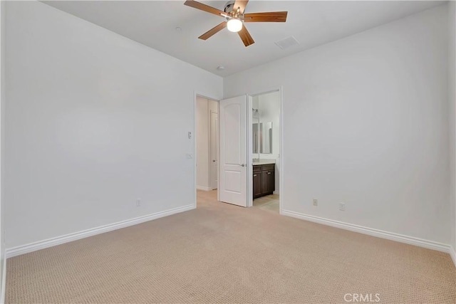 13691 Cobalt Ct, Rancho Cucamonga, CA 91739 - unfurnished bedroom featuring light carpet, baseboards, connected bathroom, and a ceiling fan