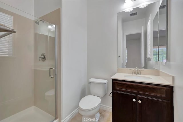 13691 Cobalt Ct, Rancho Cucamonga, CA 91739 - bathroom featuring toilet, a stall shower, vanity, and baseboards