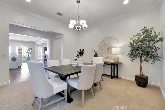 13691 Cobalt Ct, Rancho Cucamonga, CA 91739 - dining space with light carpet, a chandelier, baseboards, ornamental molding, and recessed lighting